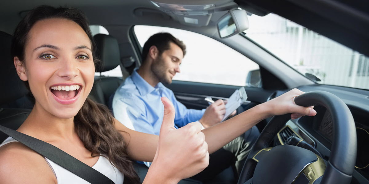 pda-happy-woman-driving-test-crop